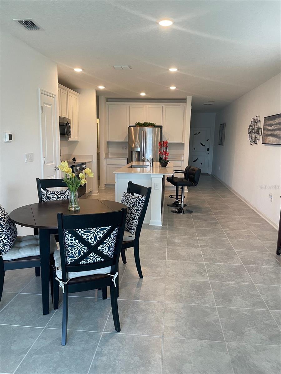 View from Living Room to Dining Area & Kitchen
