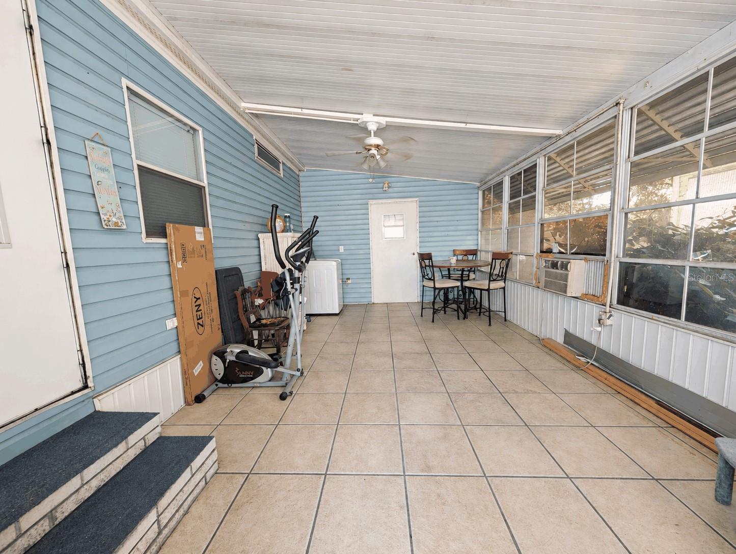 Side Screened Porch behind the Carport