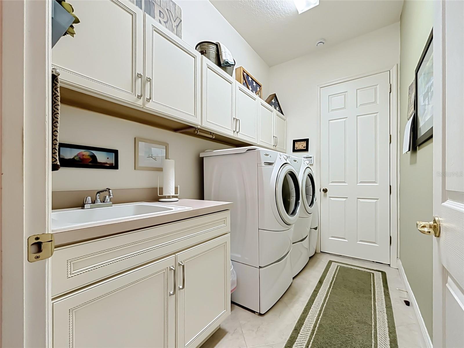 Laundry Room w/ Sink & Cabinets