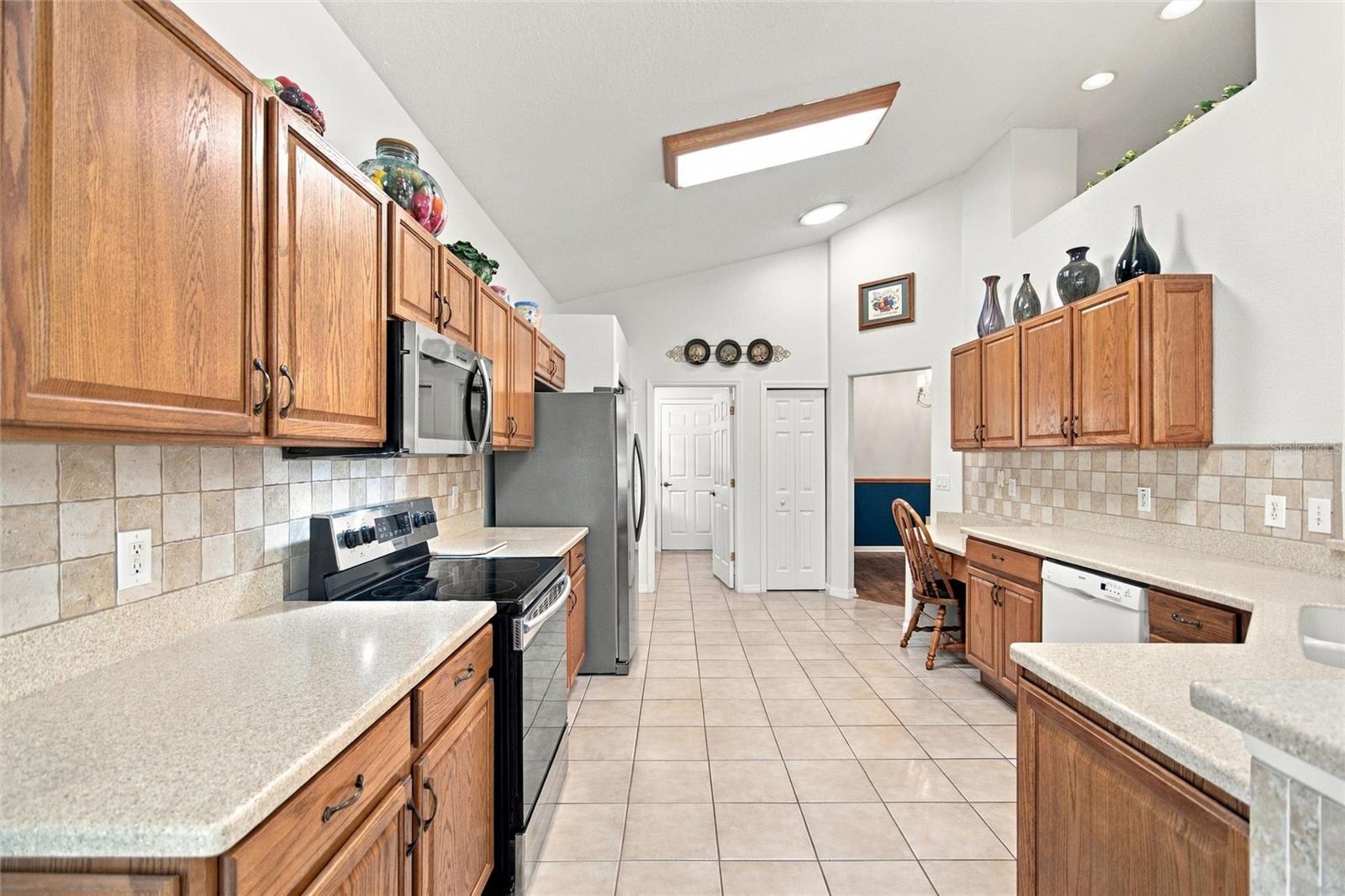 Solid surface countertops and Solid Wood cabinets