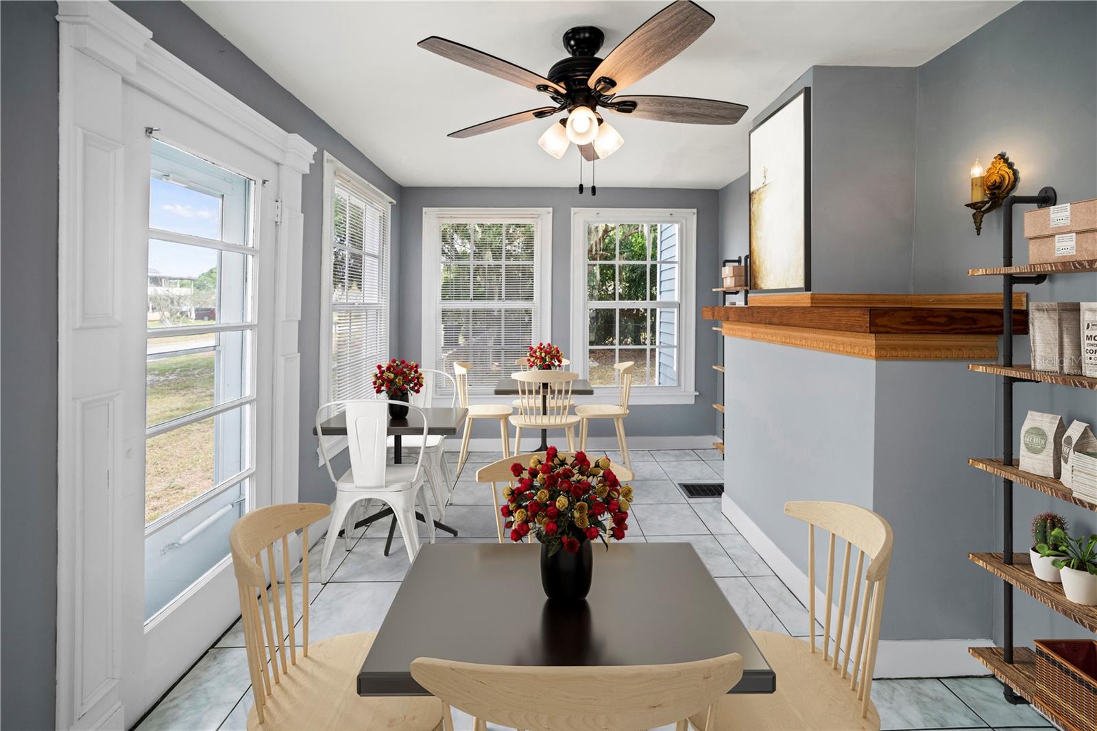 Foyer/Florida Room (virtually staged as a cafe)
