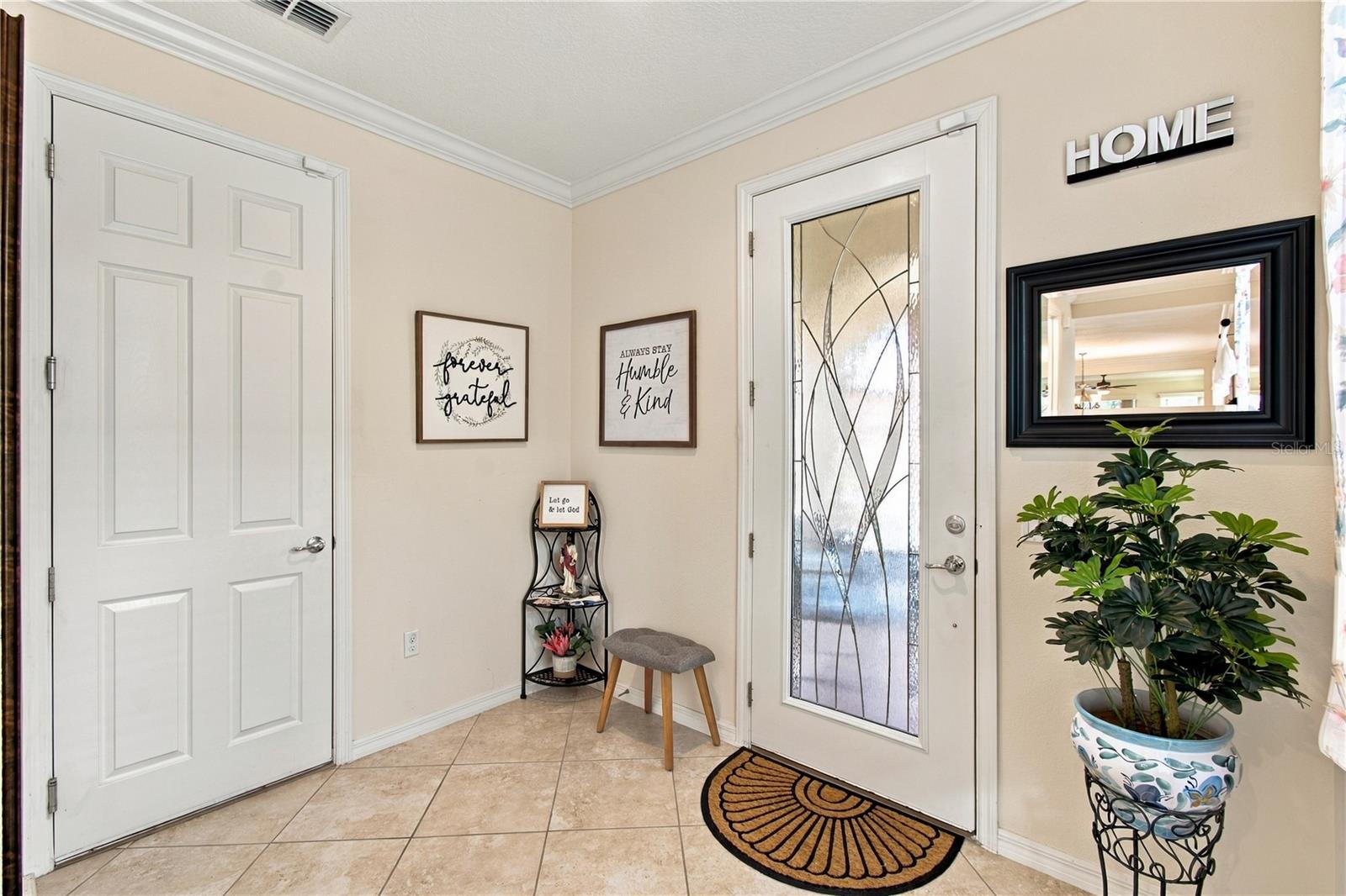 LEADED GLASS DOOR AT FRONT ENTRY