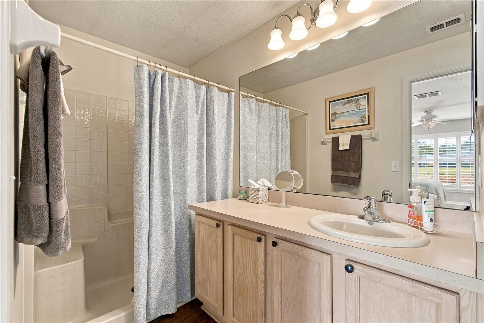 ENSUITE BATH W/ WALK-IN SHOWER