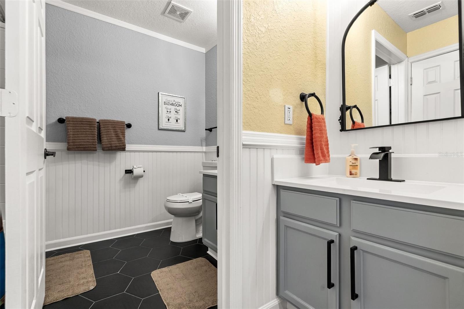 Hallway vanity area leading to Bathroom #2.