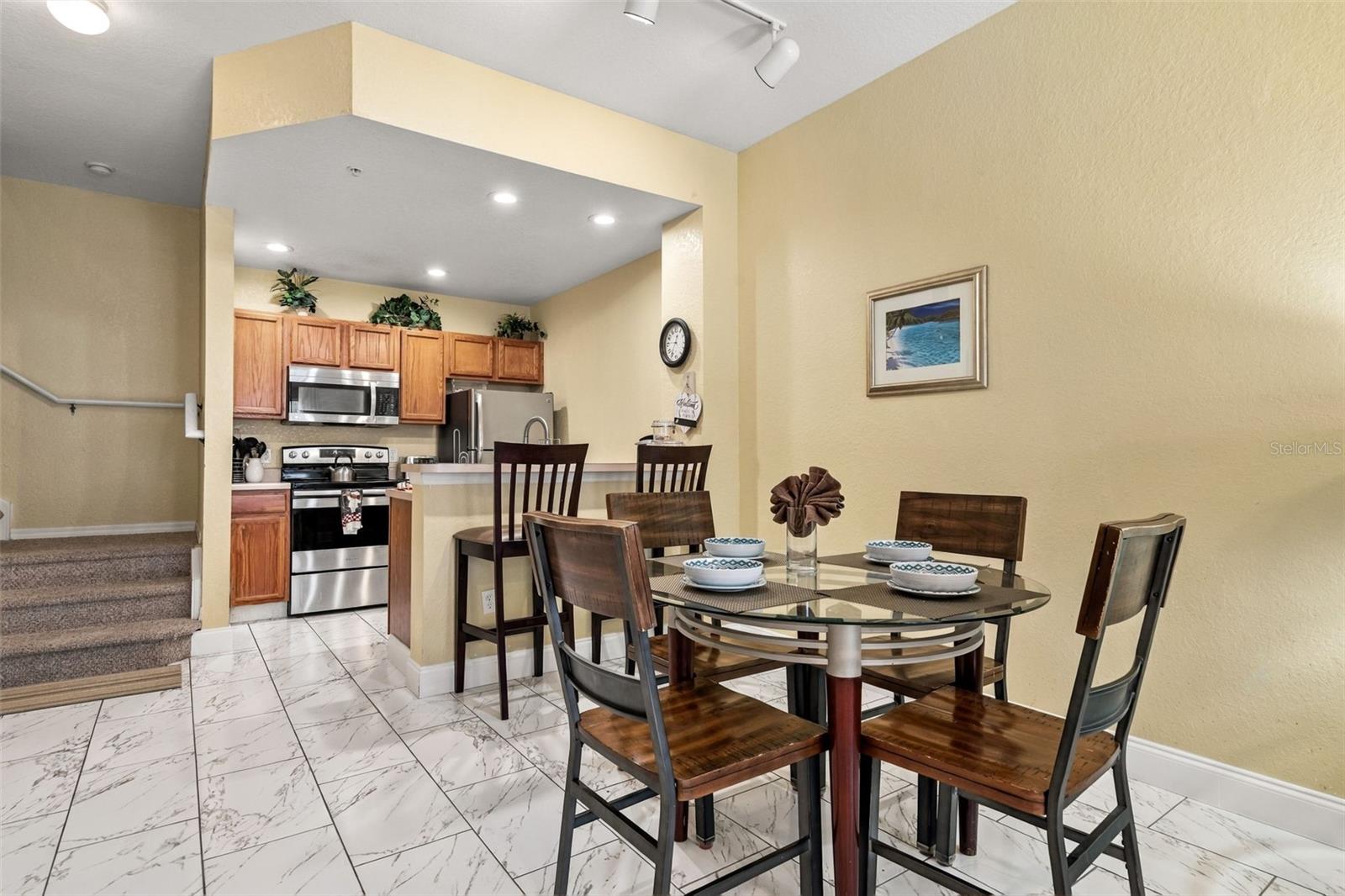 Dinning Area / Kitchen with high-top seating. Dinning Area / Kitchen with high-top seating.