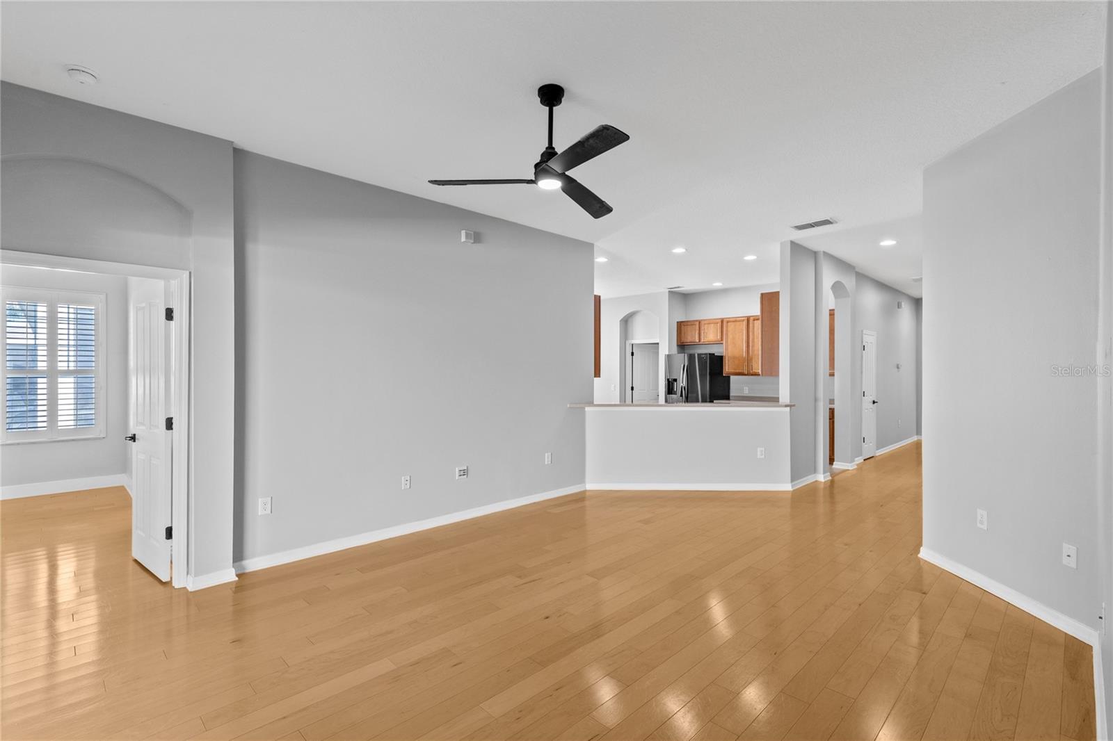 Living area off kitchen leading to Primary bedroom
