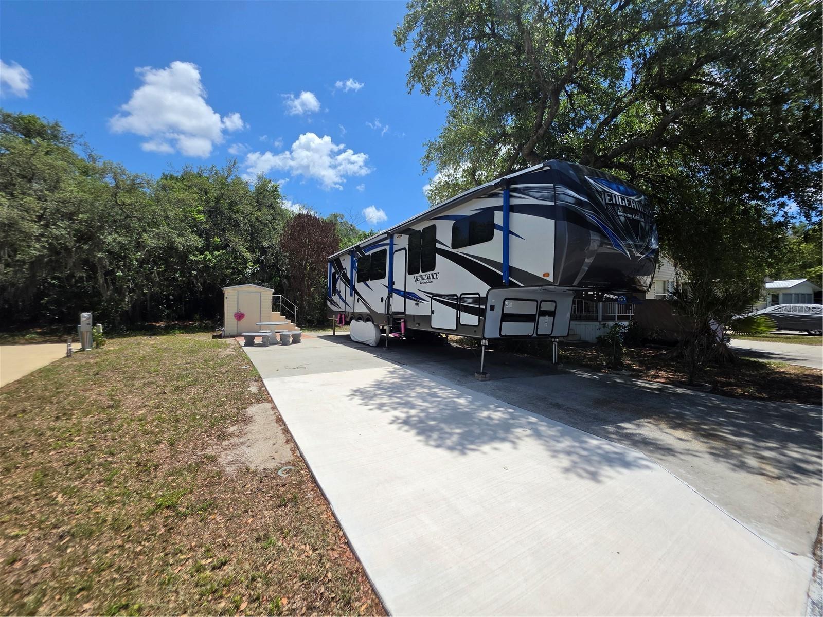 Camper in the photo is not included