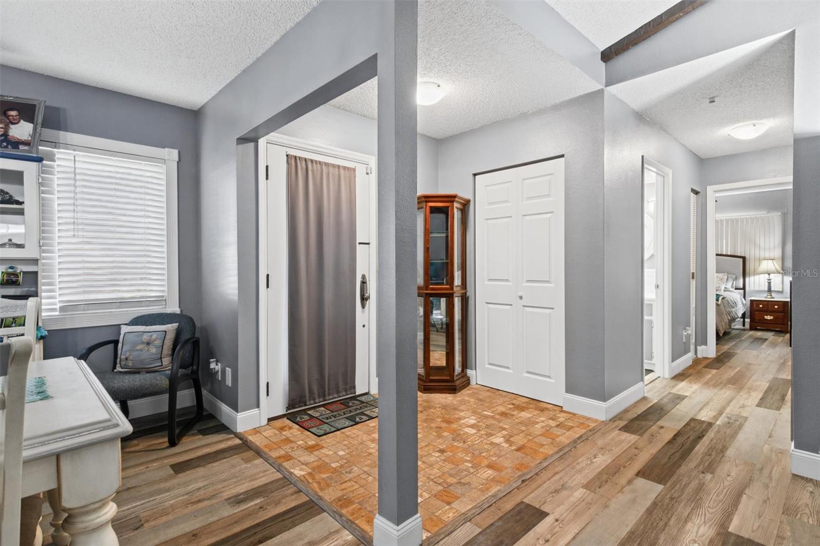 Entry Foyer - Luxury Vinyl Flooring Throughout