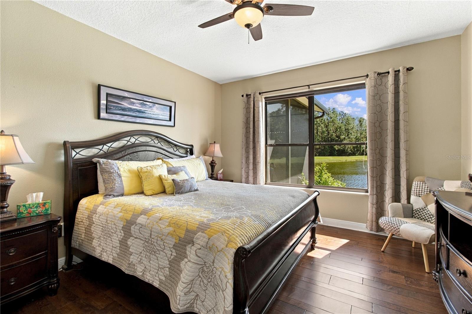 PRIMARY SUITE W/HARD WOOD FLOORS