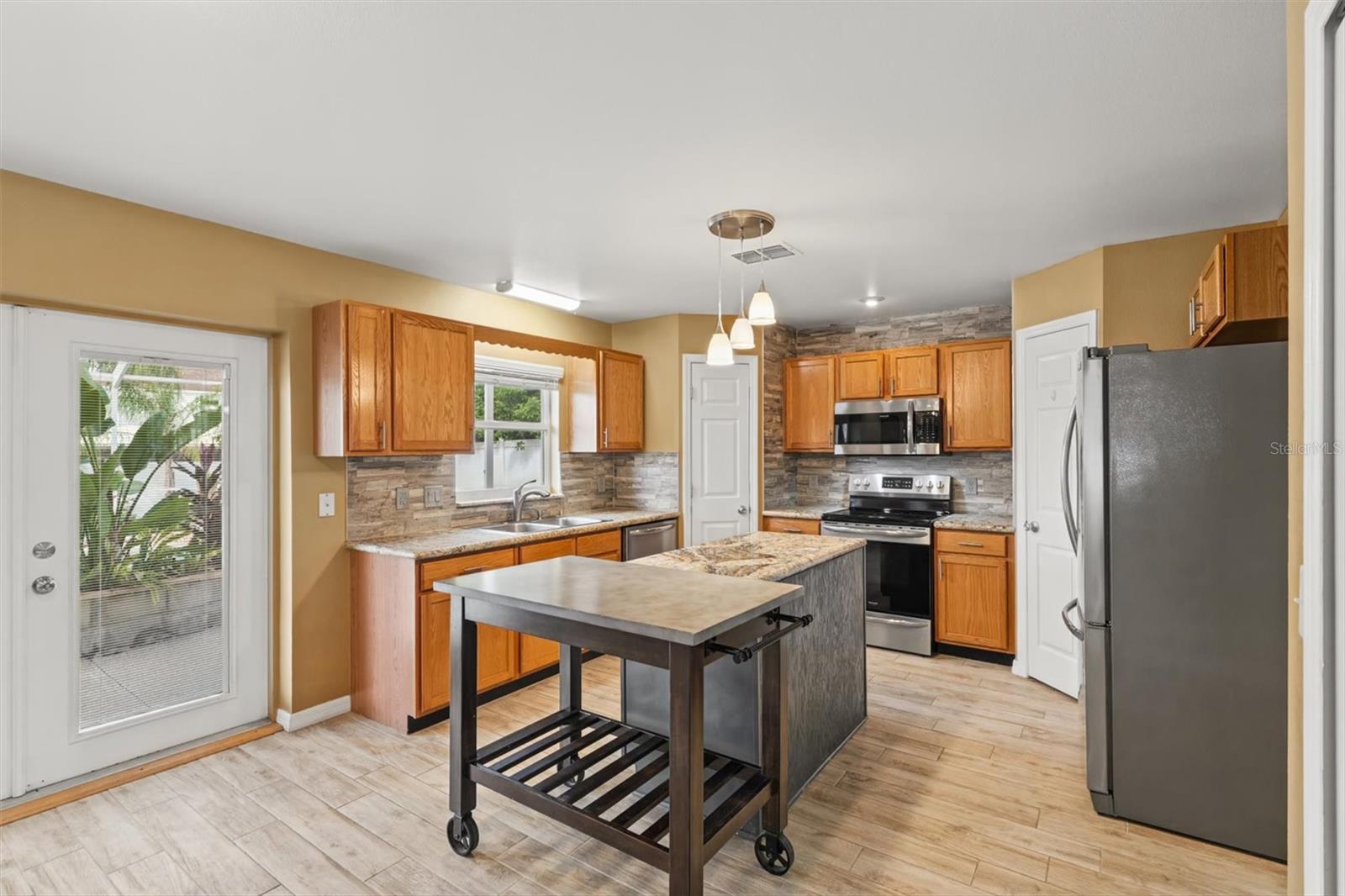 Island Kitchen - French Doors & Double Pantries
