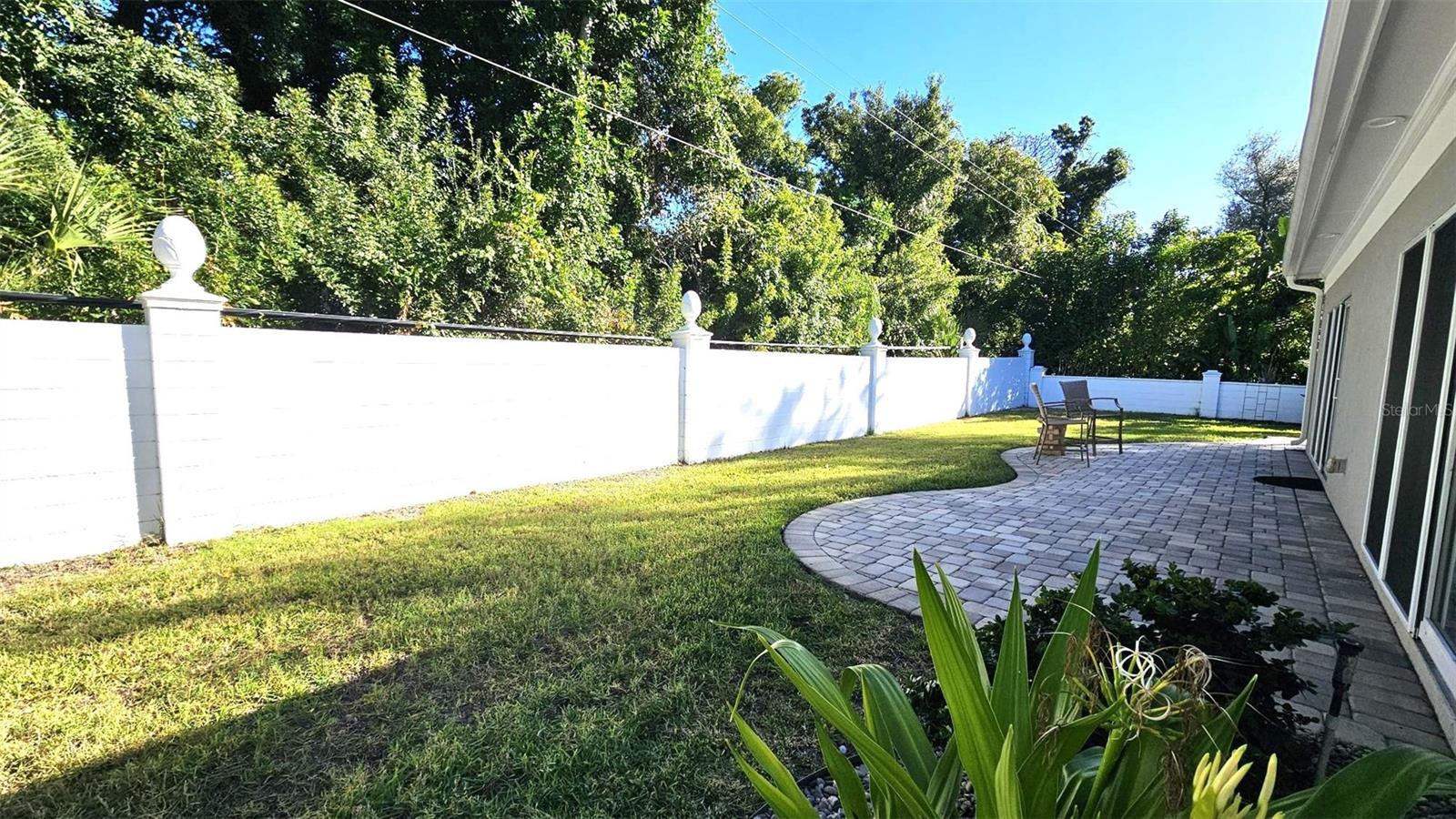 Back yard-fenced-patio area