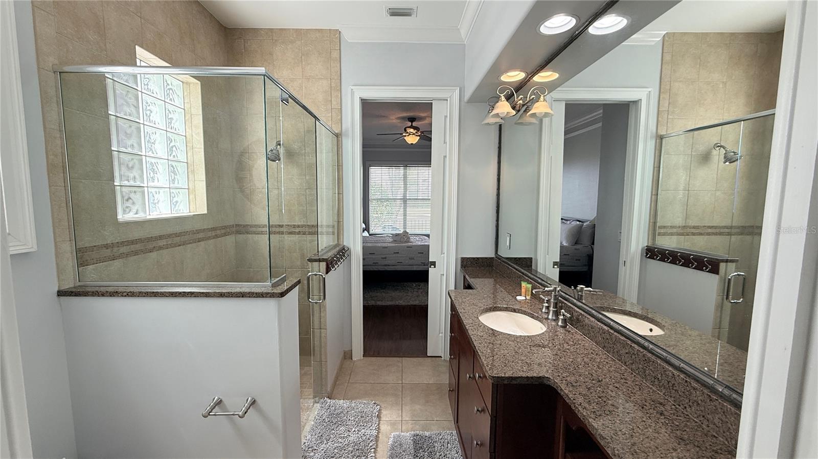 Downstairs Bathroom with doors from Downstairs bedroom and 2nd doorway from Living Room