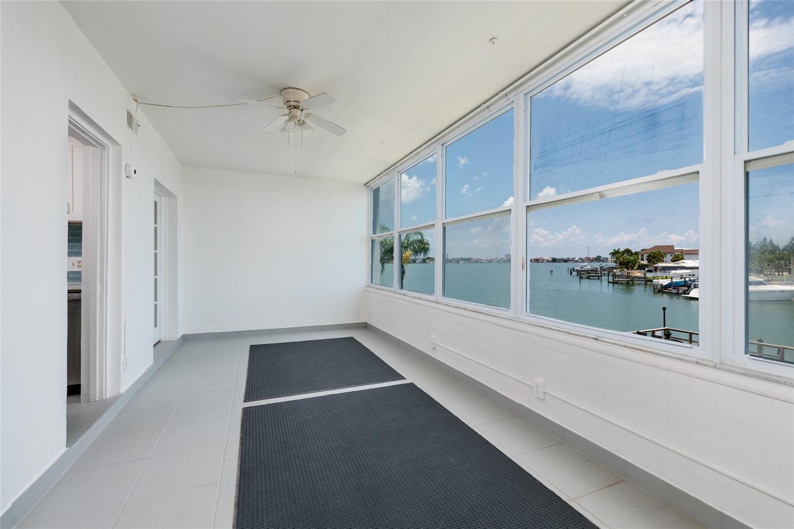 Florida Room w/Double pane windows. 21' x 9'. Boca Ciega Bay views.