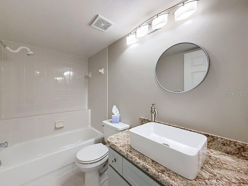 Guest bathroom just outside guest bedrooms