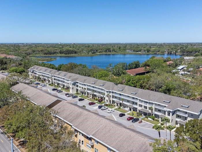Ariel view of Building 96 with pond that has dock for access
