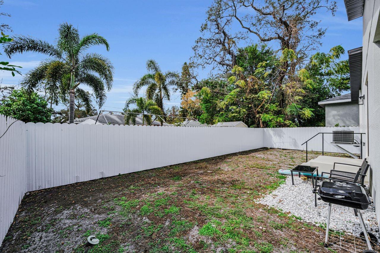 Even the fenced yard is clean and sleek!