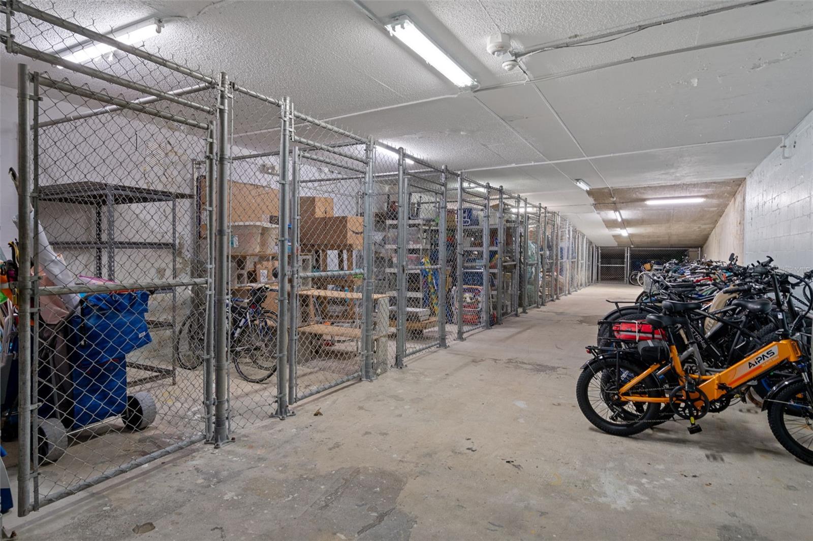 Enclosed Community Storage Area features secure cages for a fee (waiting list) as well as open bike and board storage.