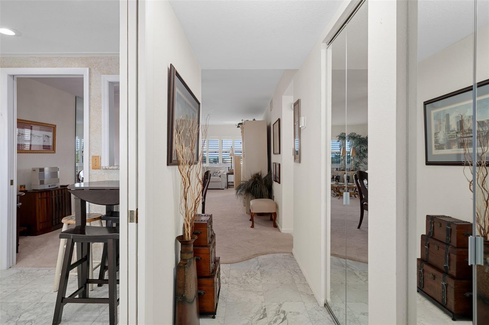 Enter unit into foyer or step into kitchen on the left