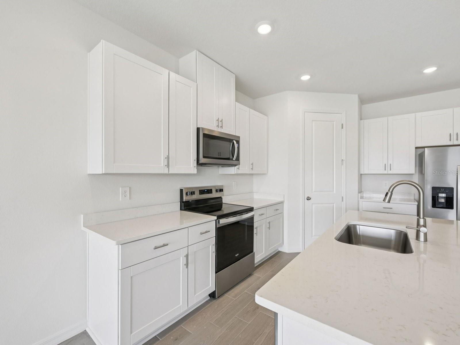 Interior photos are not of the actual home but are photos of the builder home with the same floorplan with similar interior finishes and features.
