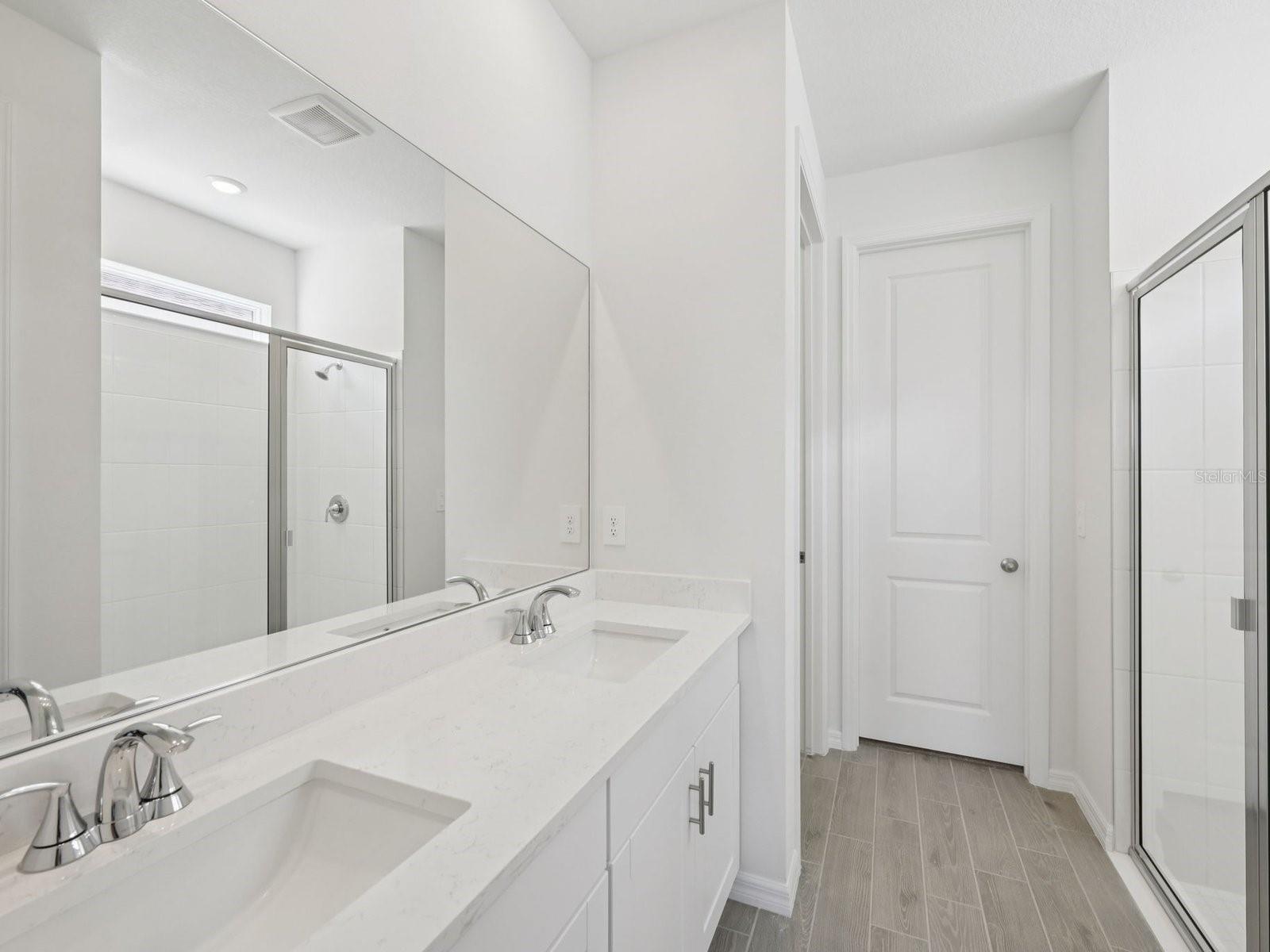 Interior photos are not of the actual home but are photos of the builder home with the same floorplan with similar interior finishes and features.