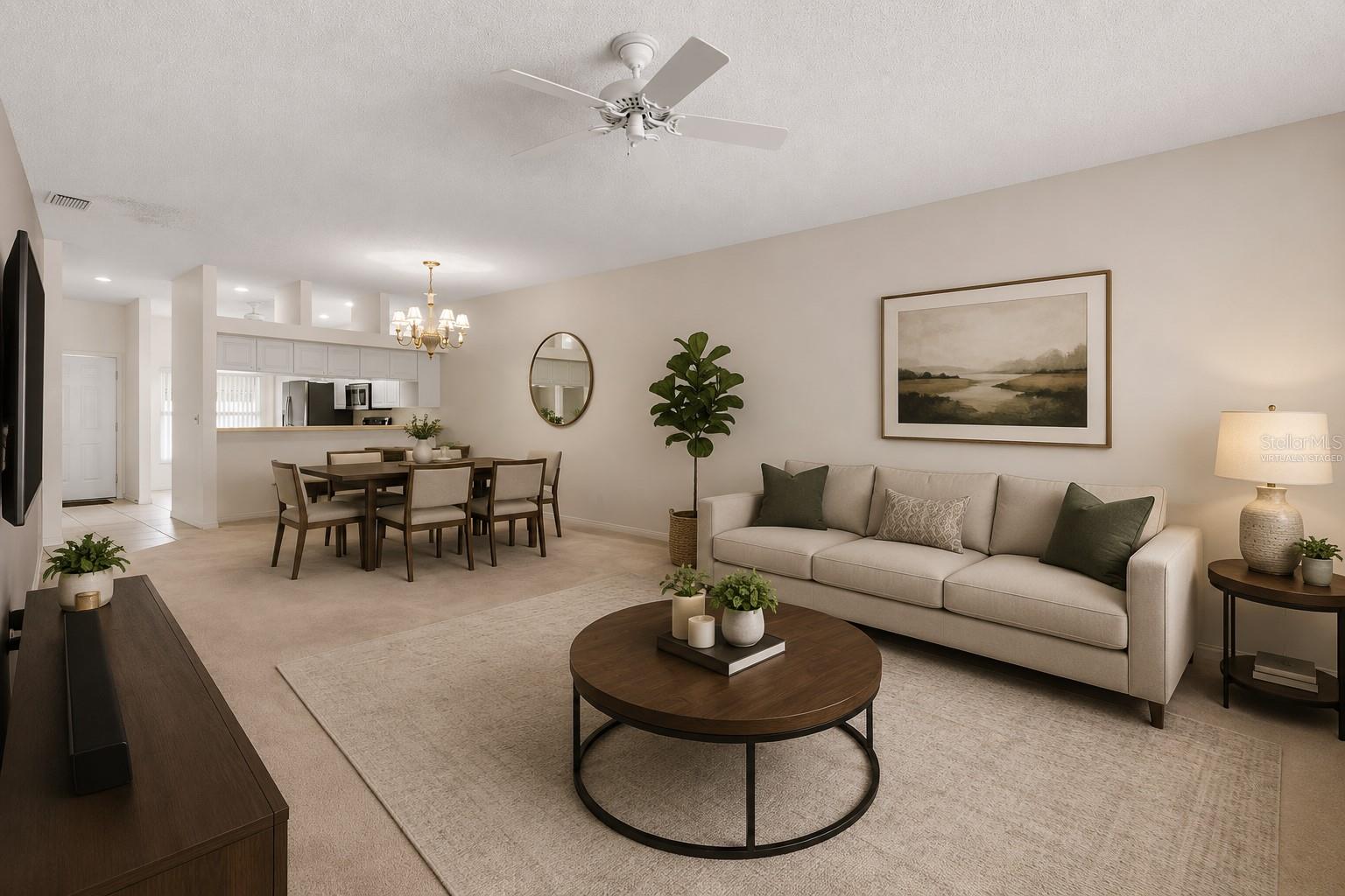 Expansive living room with generous proportions and a versatile layout that easily accommodates multiple seating arrangements or a combined living and workspace setup. This photo has been virtually staged. Expansive living room with generous proportions and a versatile layout that easily accommodates multiple seating arrangements or a combined living and workspace setup. This photo has been virtually staged.