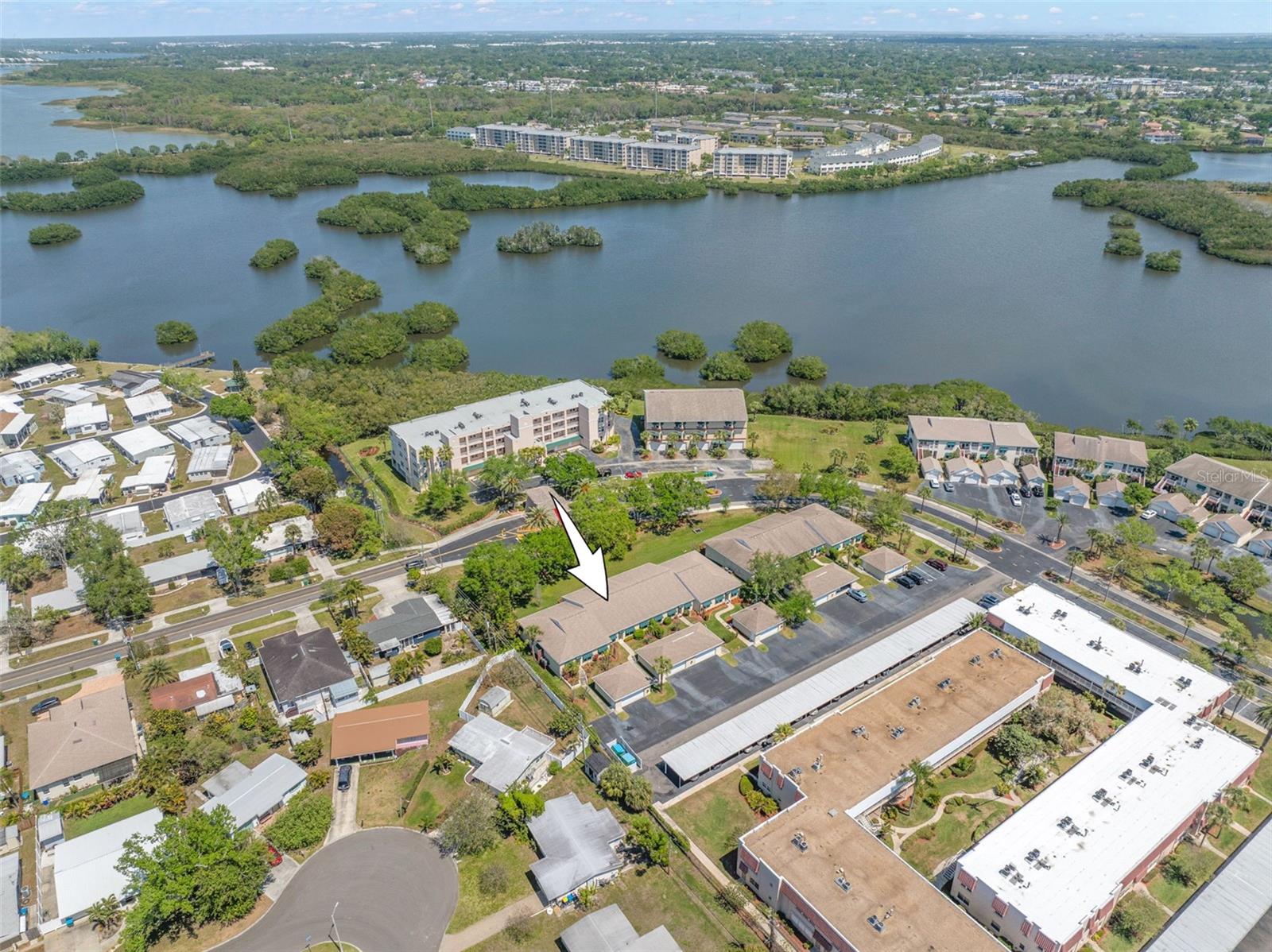 Aerial view showing where the property is located within the community and near waterways.