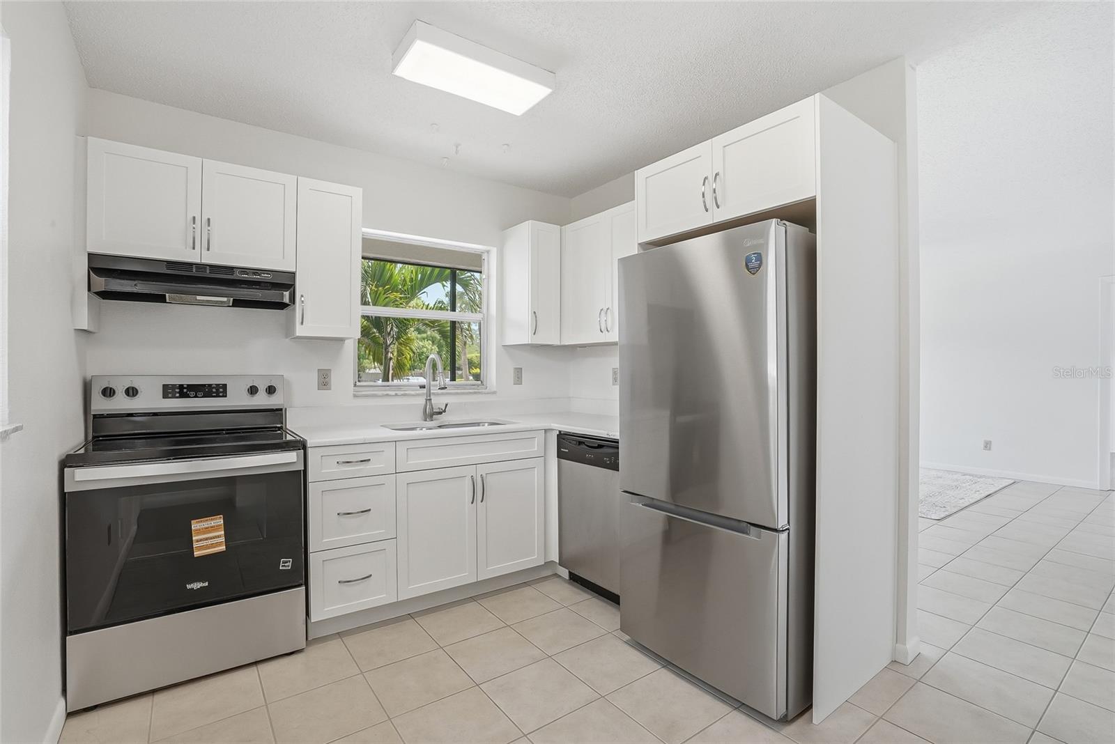 Kitchen area opens to the living and dining area