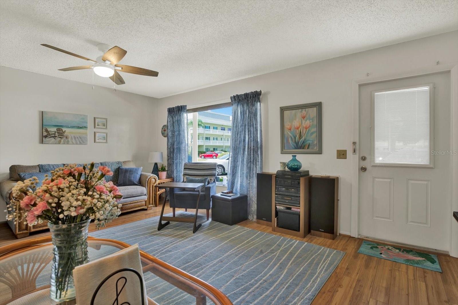 Spacious-Living-Room-Ceiling-Fan-Vinyl-Floors-Condo-Clearwater-FL