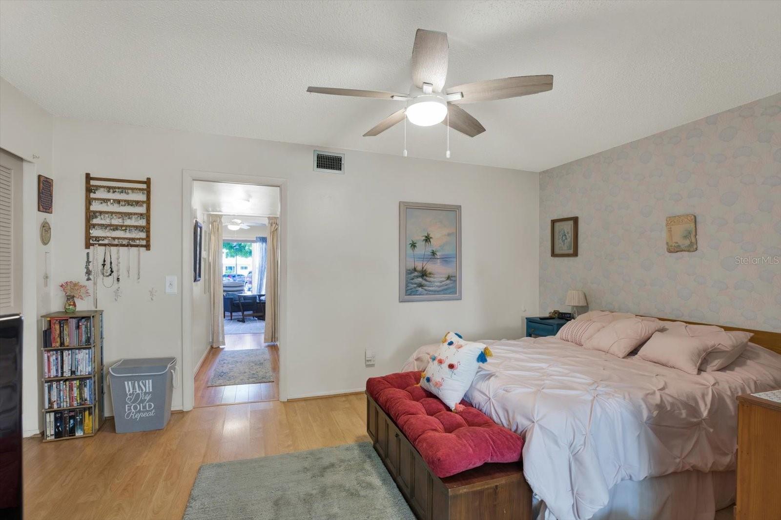 Primary-Bedroom-Vinyl-Floors-Ceiling-Fan-Natural-Light-Clearwater-FL