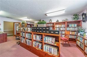 LIBRARY IN THE MAIN CLUBHOUSE.