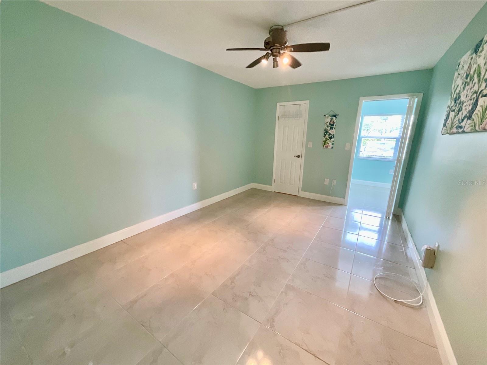 Bedroom with walk-in closet