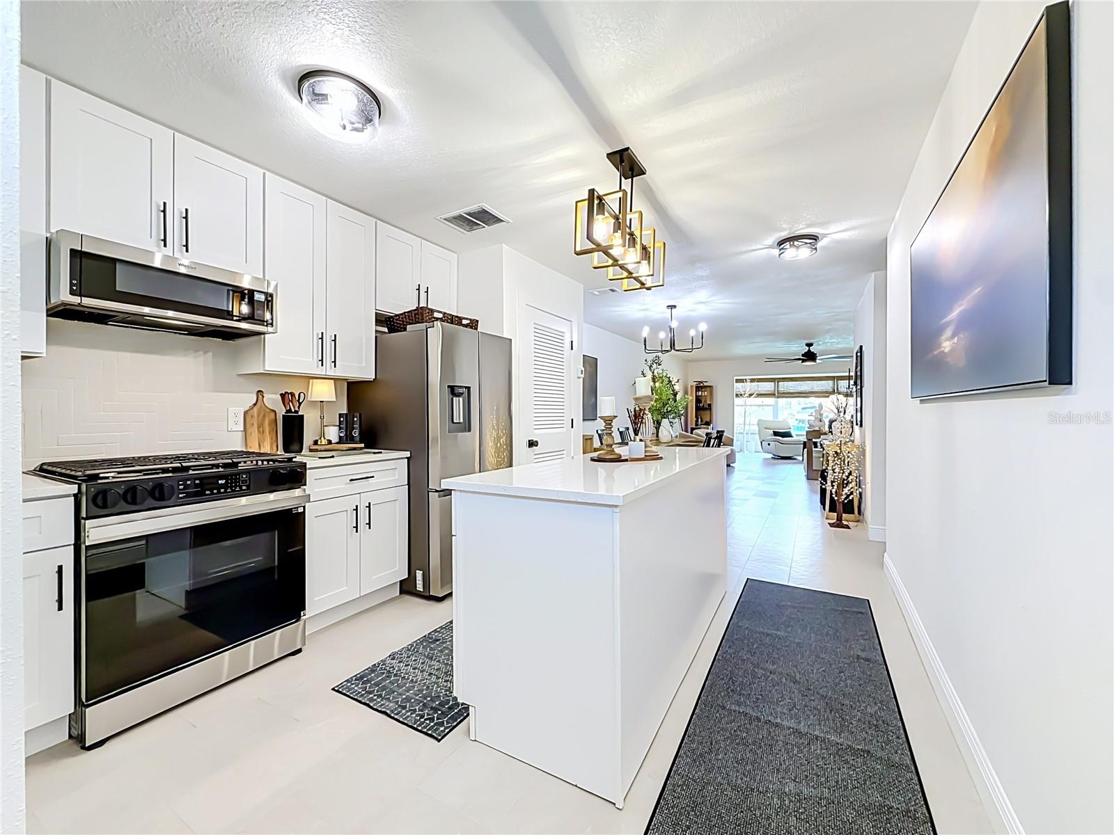Updated kitchen with shaker cabinetry Updated kitchen with shaker cabinetry