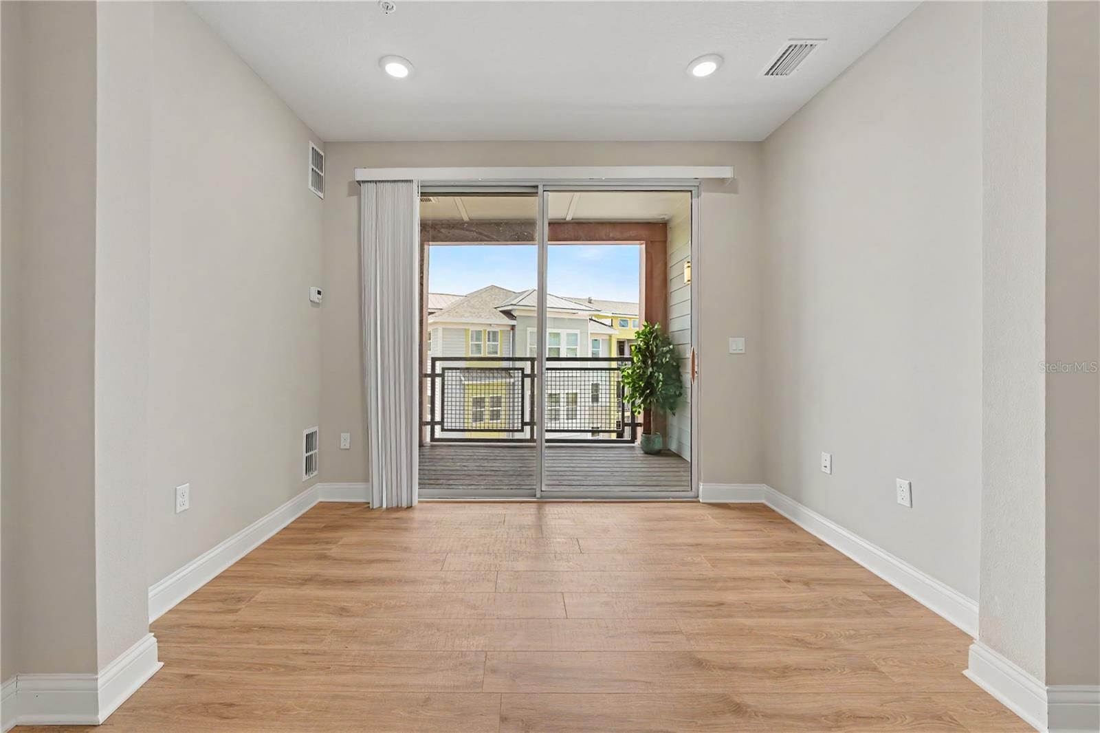 Additional area extending from the Great room with access to your balcony.  Extra storage room with shelving and the perfect end unit location to enjoy sunrises each day