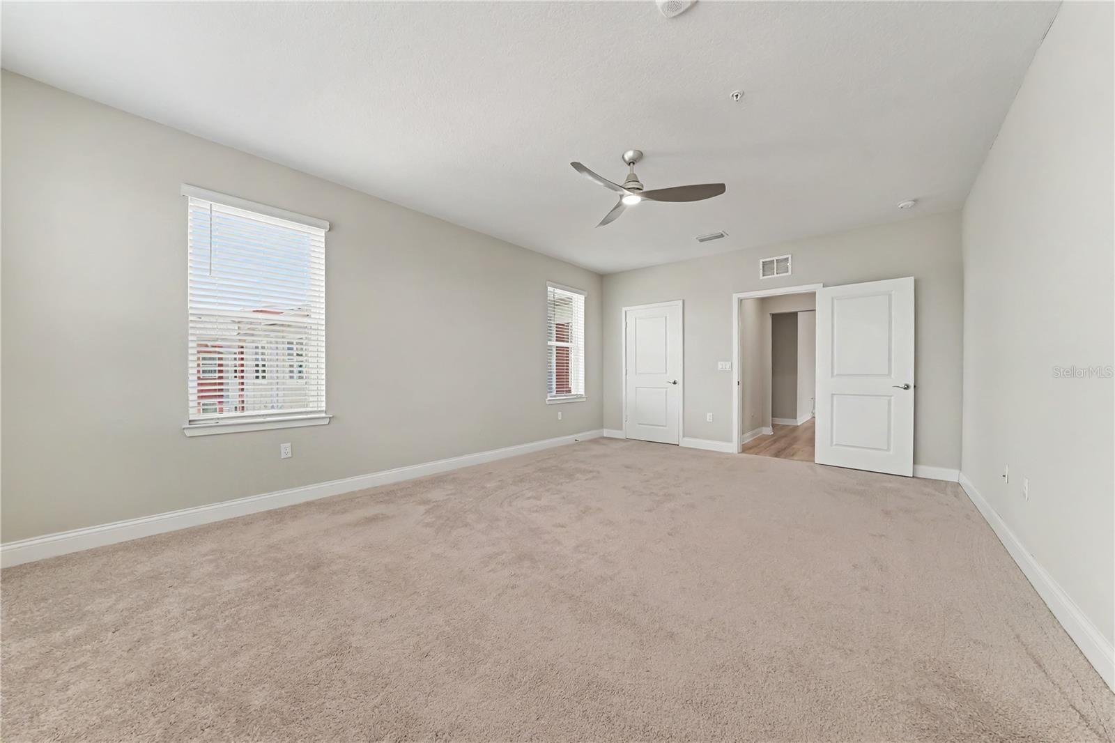 Primary Ensuite Bedroom with custom closet