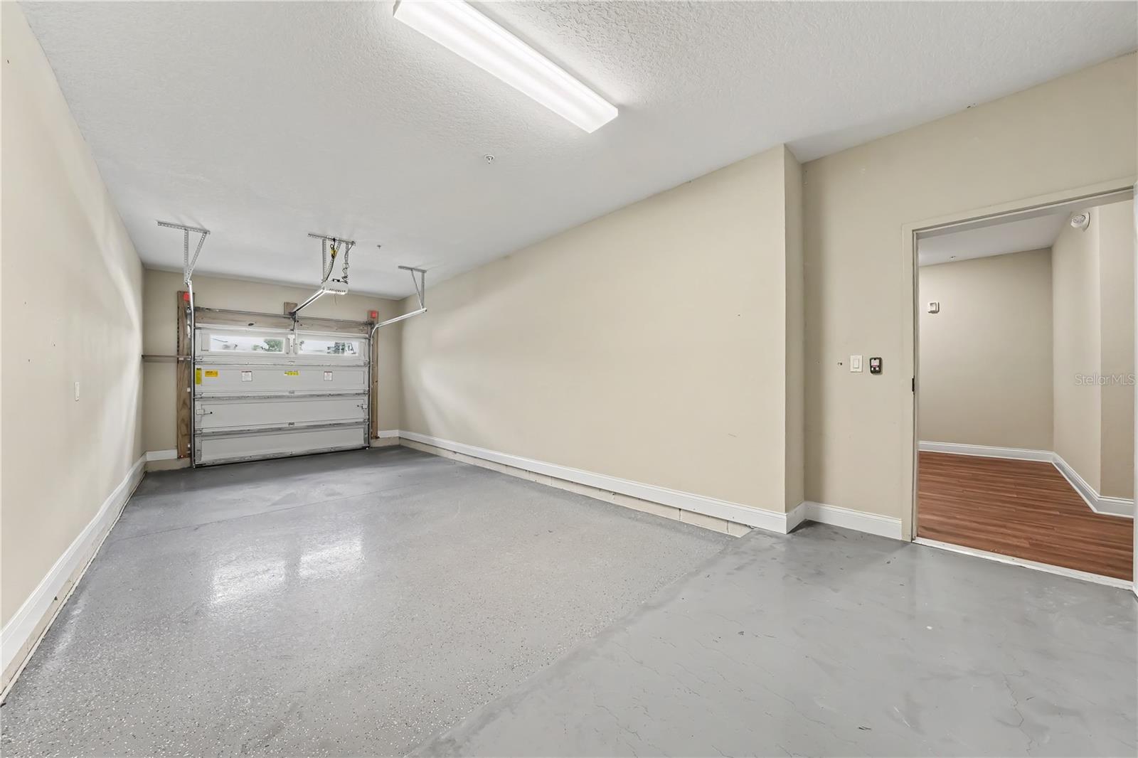 Private garage with entry to building/lobby/elevator