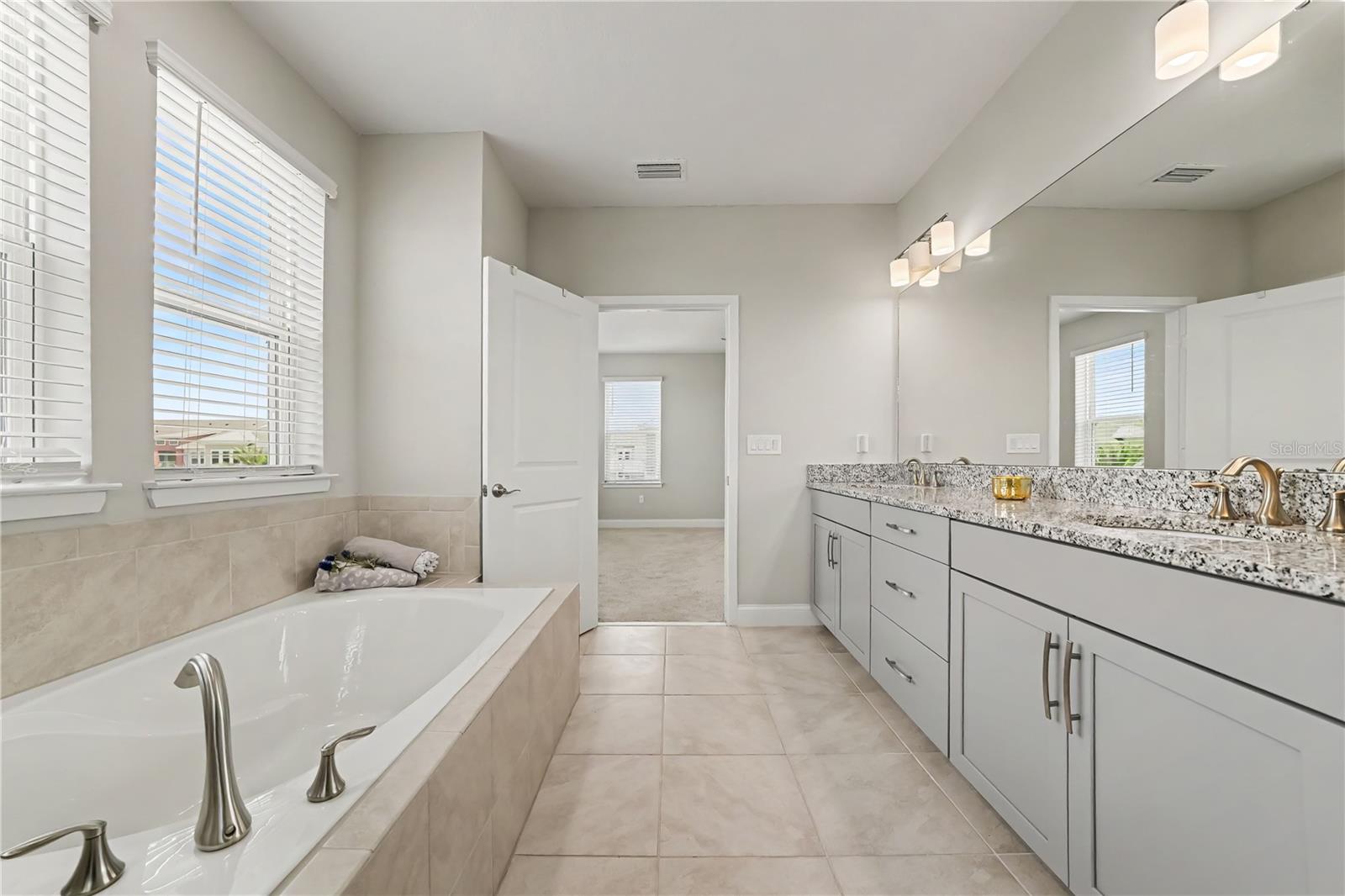 Upgraded features in this custom primary bathroom