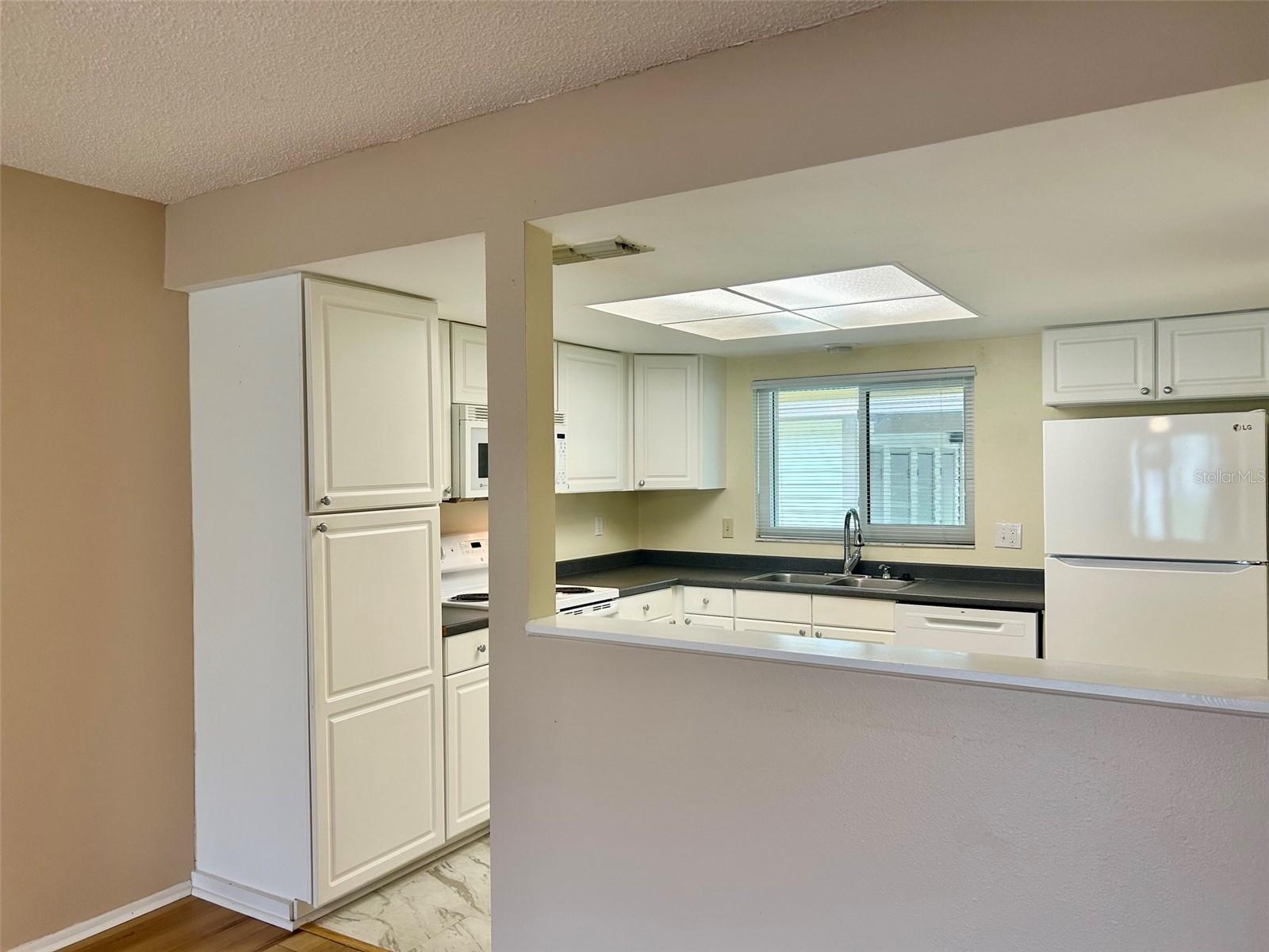 Kitchen With Pass Through To Great Room