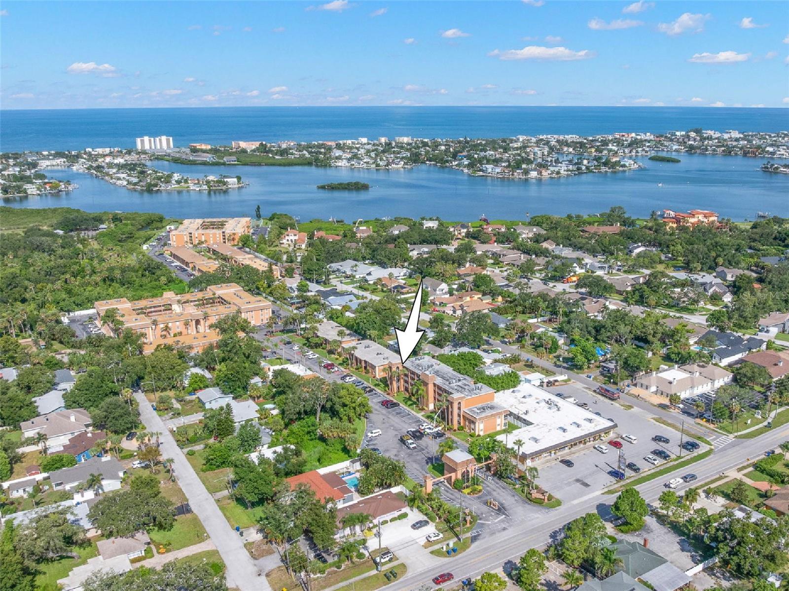 The communitys location comes into focus from above, with the Intracoastal Waterway and Gulf of Mexico stretching across the horizon and Indian Rocks Beach just beyond.