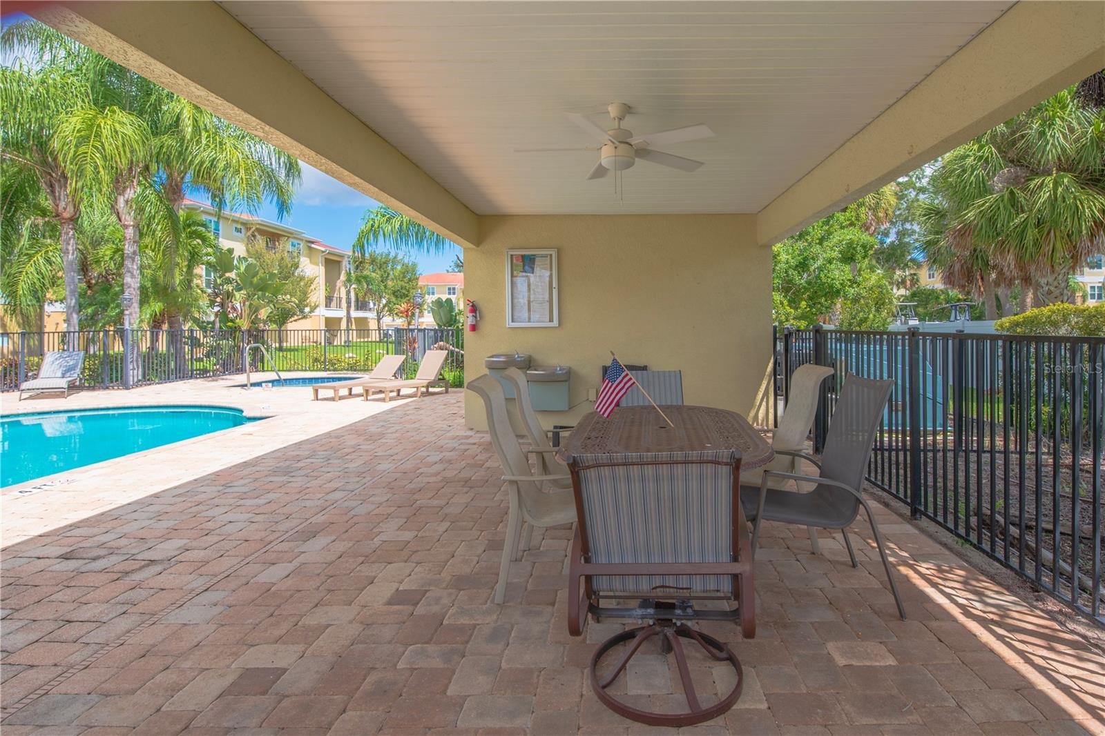 Covered area by the pool.