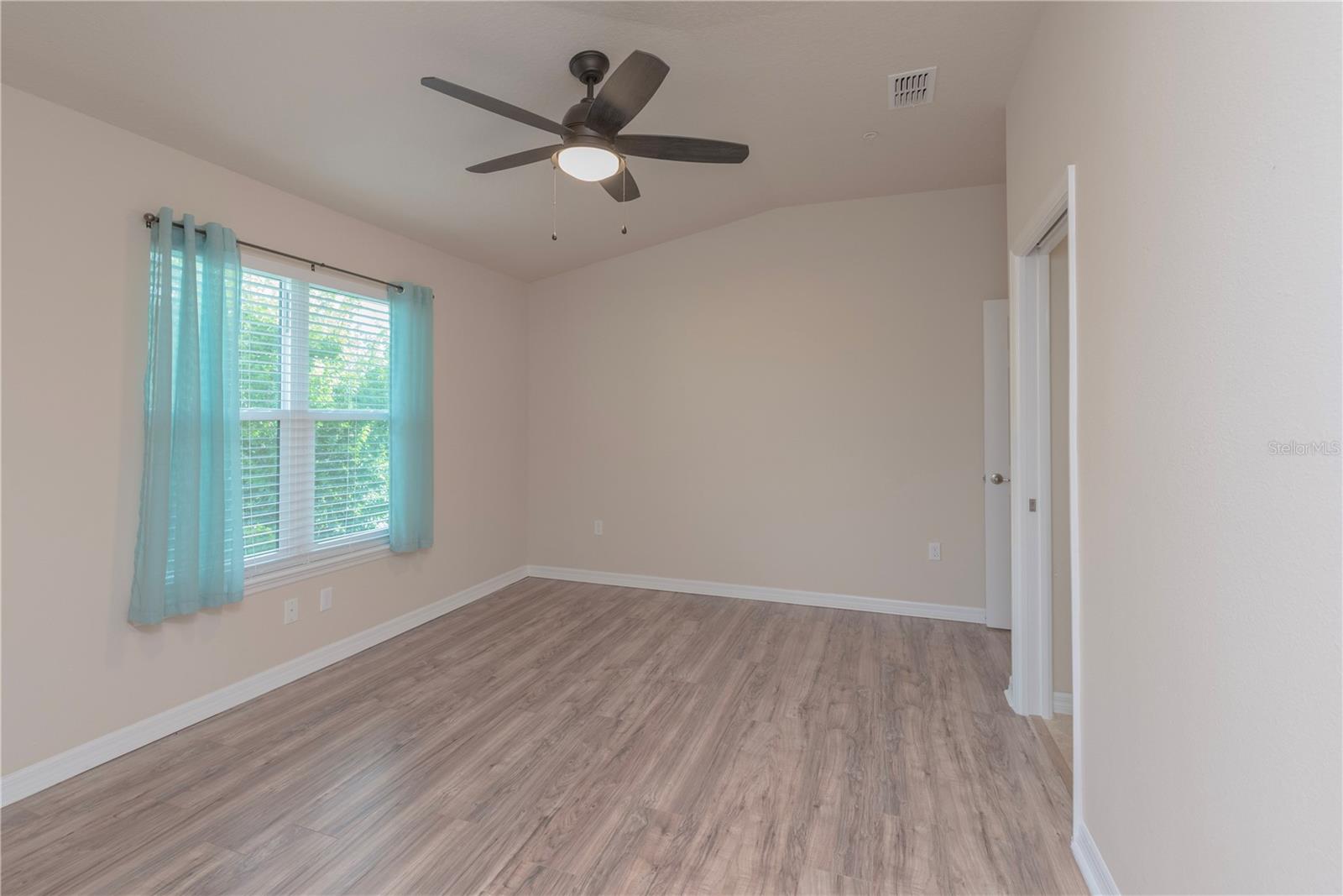Primary bedroom has walk-in closet.