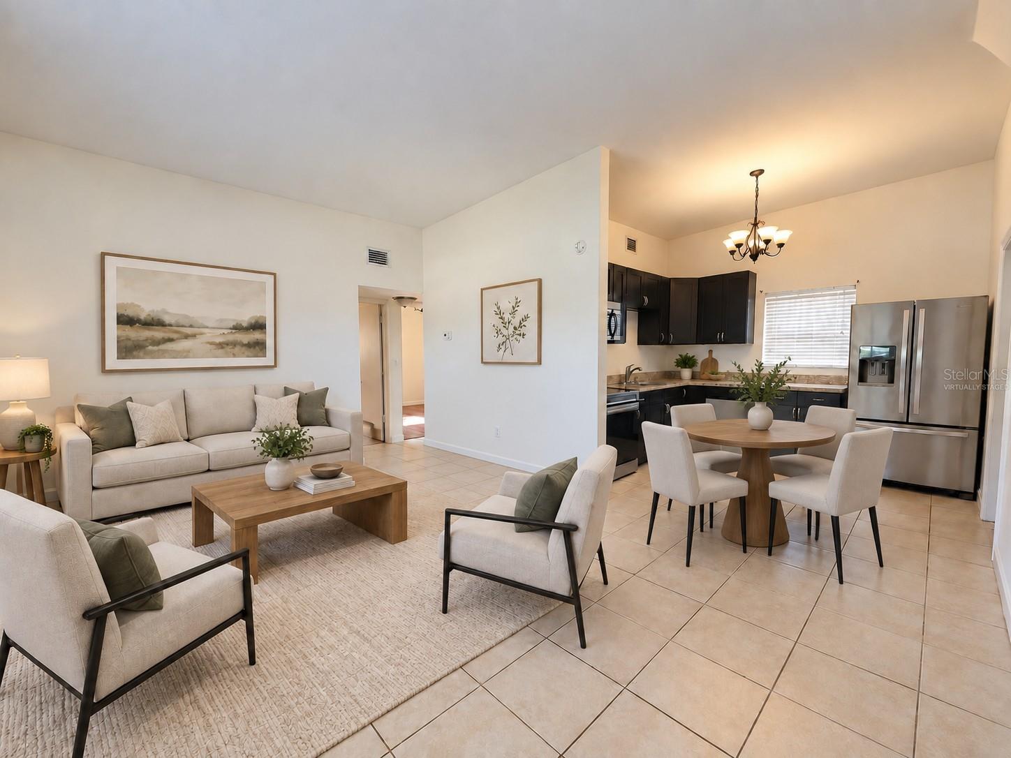 Virtually staged LR/Kitchen Virtually staged LR/Kitchen