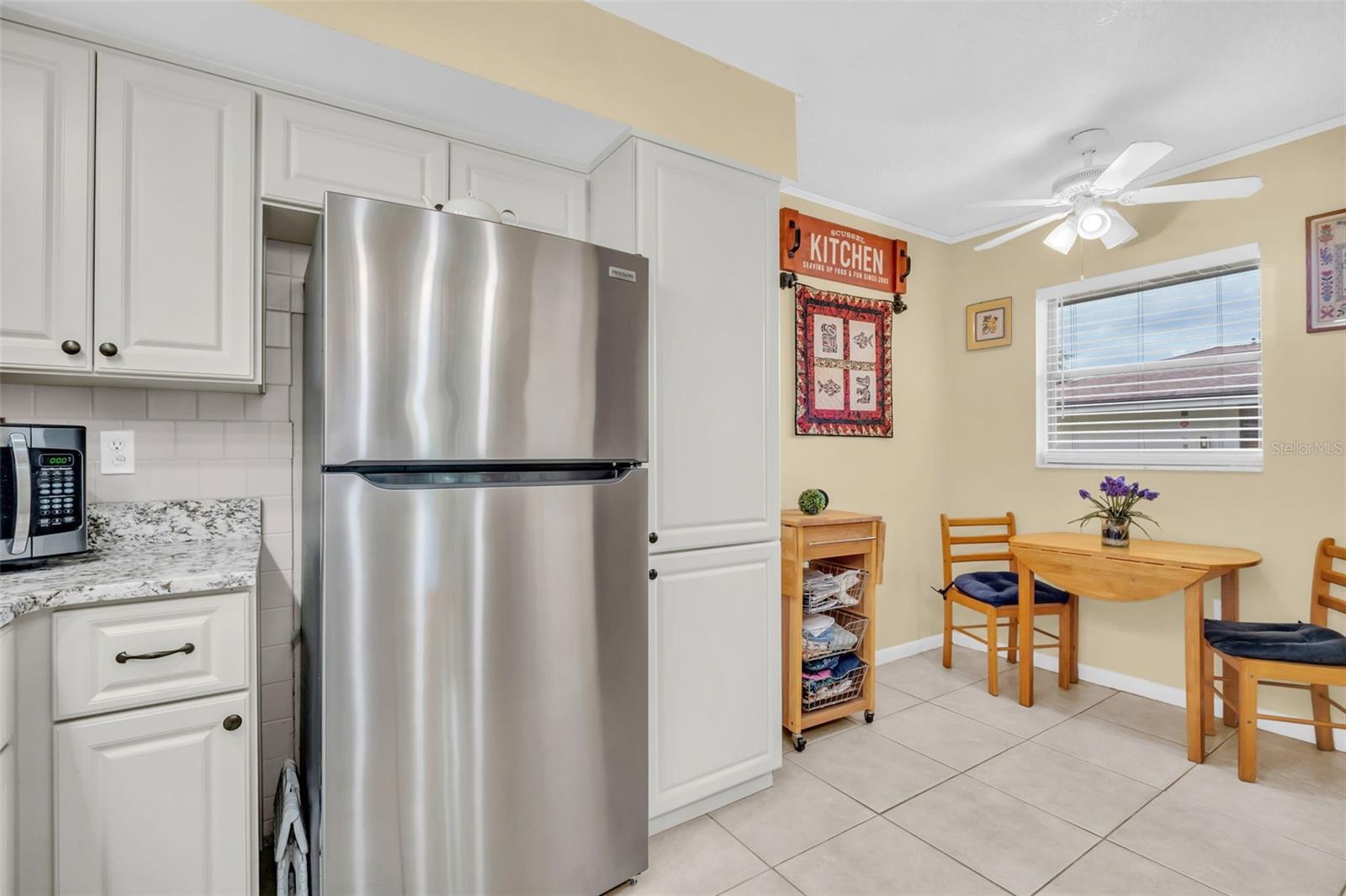 Sleek stainless refrigerator, microwave, and dishwasher~