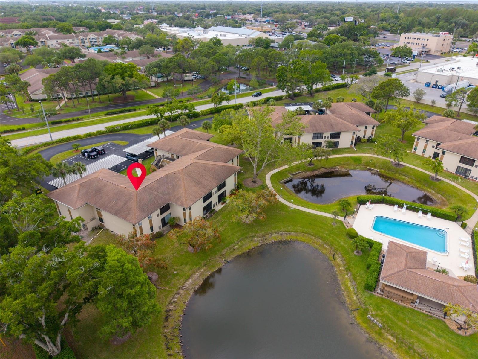 Perfectly located with both pond & pool views~