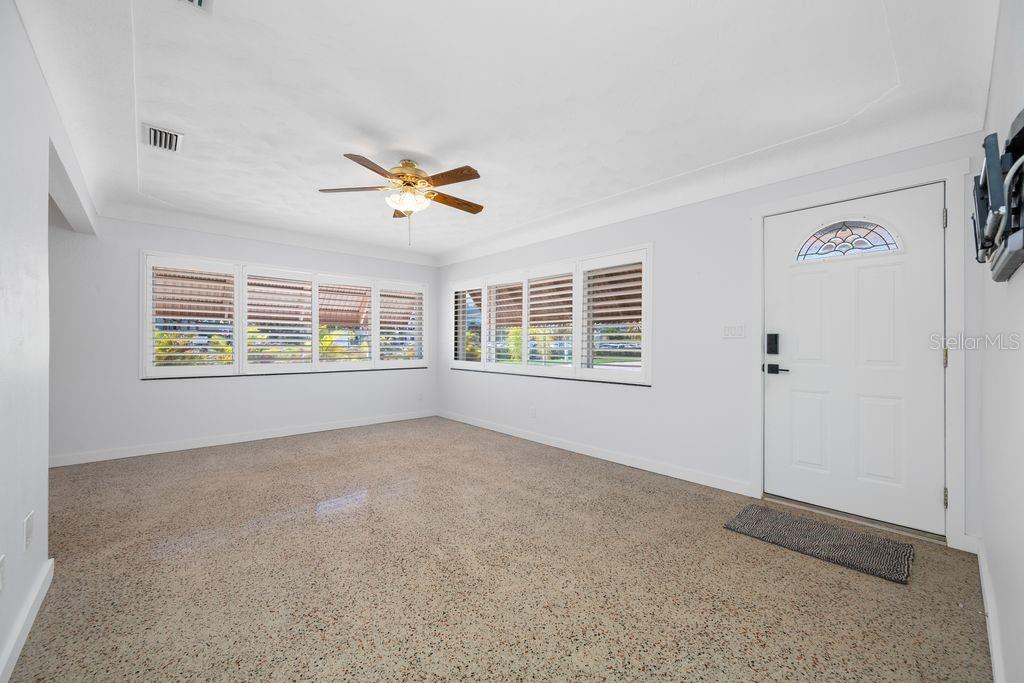 View from Hallway - Front Door and Living Room