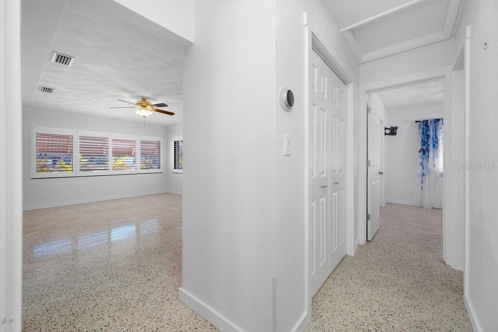Hallway from Primary Bedroom - Showing Living Room and Split Plan Guest Bedroom