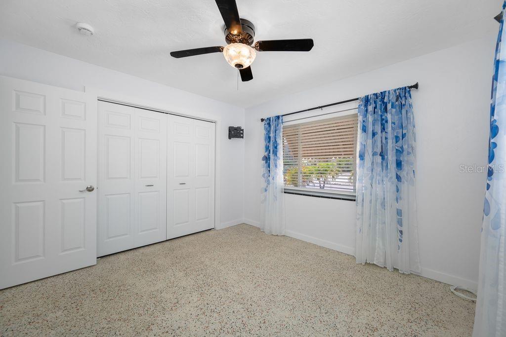 Guest Bedroom with Built In Closets