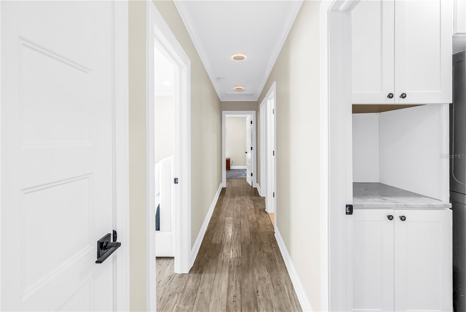 Low- Glow nightlight setting on recessed lighting in bedrooms and hallway. It lights from underneath for a glow that makes walking around at night safe and easy.