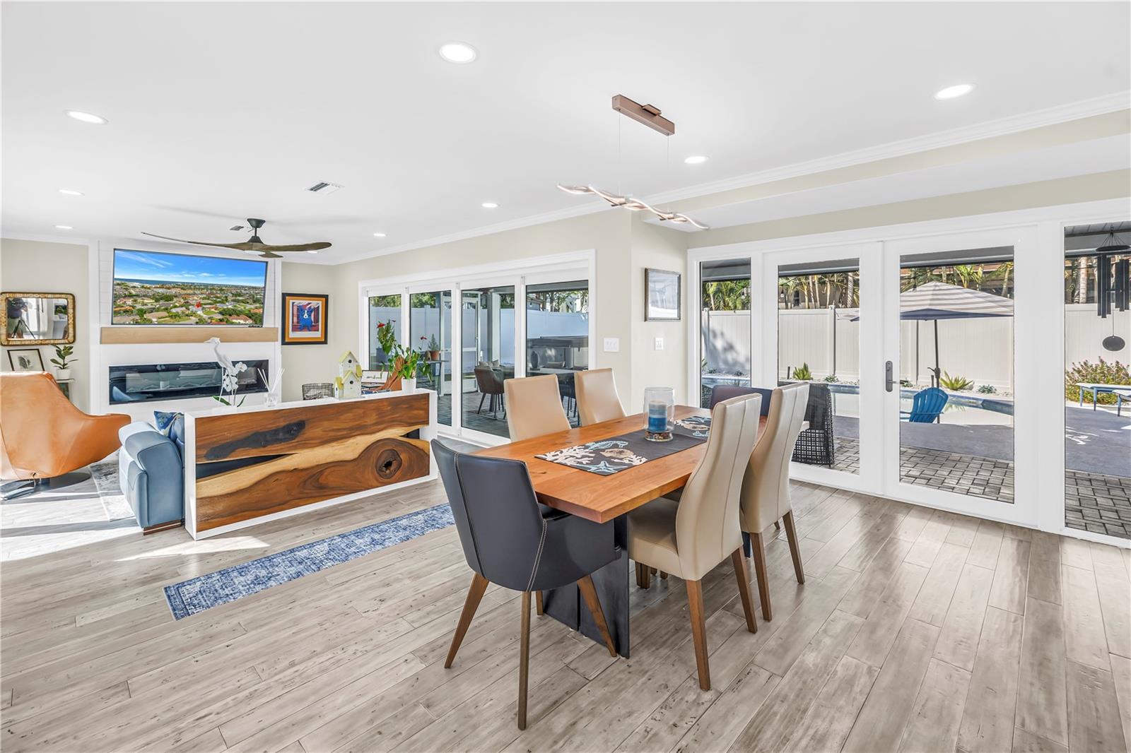 Dining room opens into lanai through French Doors.