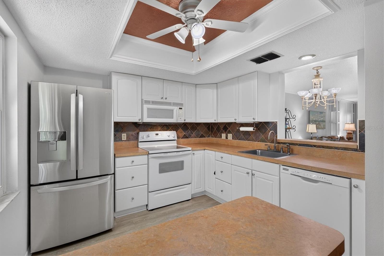 Newer appliances and wood cabinets Newer appliances and wood cabinets