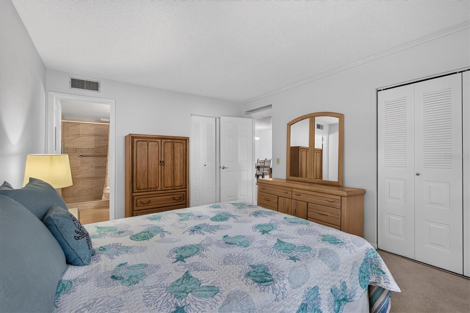 Dual closets and en-suite bath.